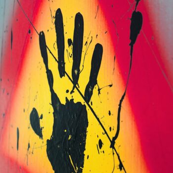 Human handprint symbol on painting by Davide Canepa.