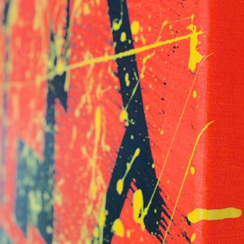 Yellow and black paint on orange unframed canvas by Davide Canepa.